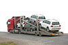 Transporter with cars in back, | Stock Foto