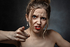 Woman point at camera | Stock Foto