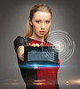 Futuristic woman with tablet pc | Stock Foto