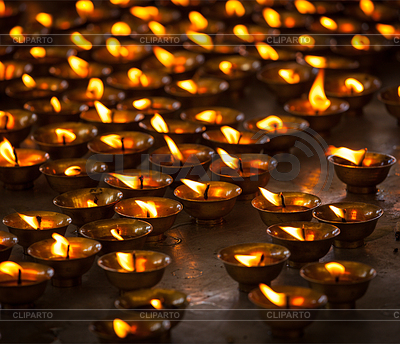 Burning candles in Buddhist temple, McLeod Ganj | High resolution stock photo |ID 4631499