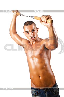 Man in martial arts concept with nunchucks | High resolution stock photo |ID 3494429