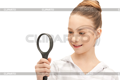 Teenage girl with magnifying glass | High resolution stock photo |ID 3633299