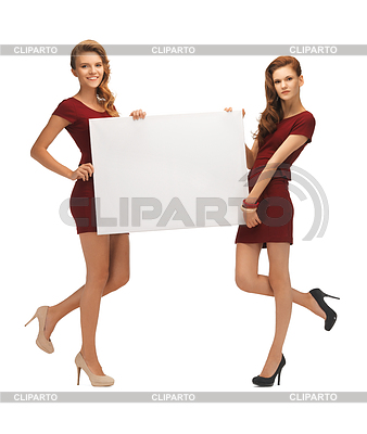 Two teenage girls in red dresses with blank board | High resolution stock photo |ID 3652878