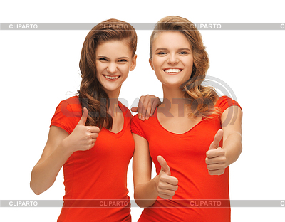 Niñas adolescentes wo en rojo camisetas que muestran los pulgares para arriba | Foto de alta resolución |ID 3653265