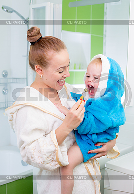 Happy mother and child teeth brushing and tongue | High resolution stock photo |ID 4648955