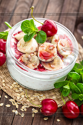 Fresh yogurt with cherry, banana and oats, healthy | High resolution stock photo |ID 6275207