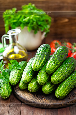 Fresh cucumbers on wooden table | High resolution stock photo |ID 6290345