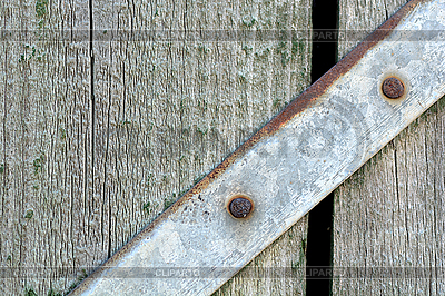 Cabeza de tornillo de metal grande en la placa de madera | Foto de alta resolución |ID 5447865